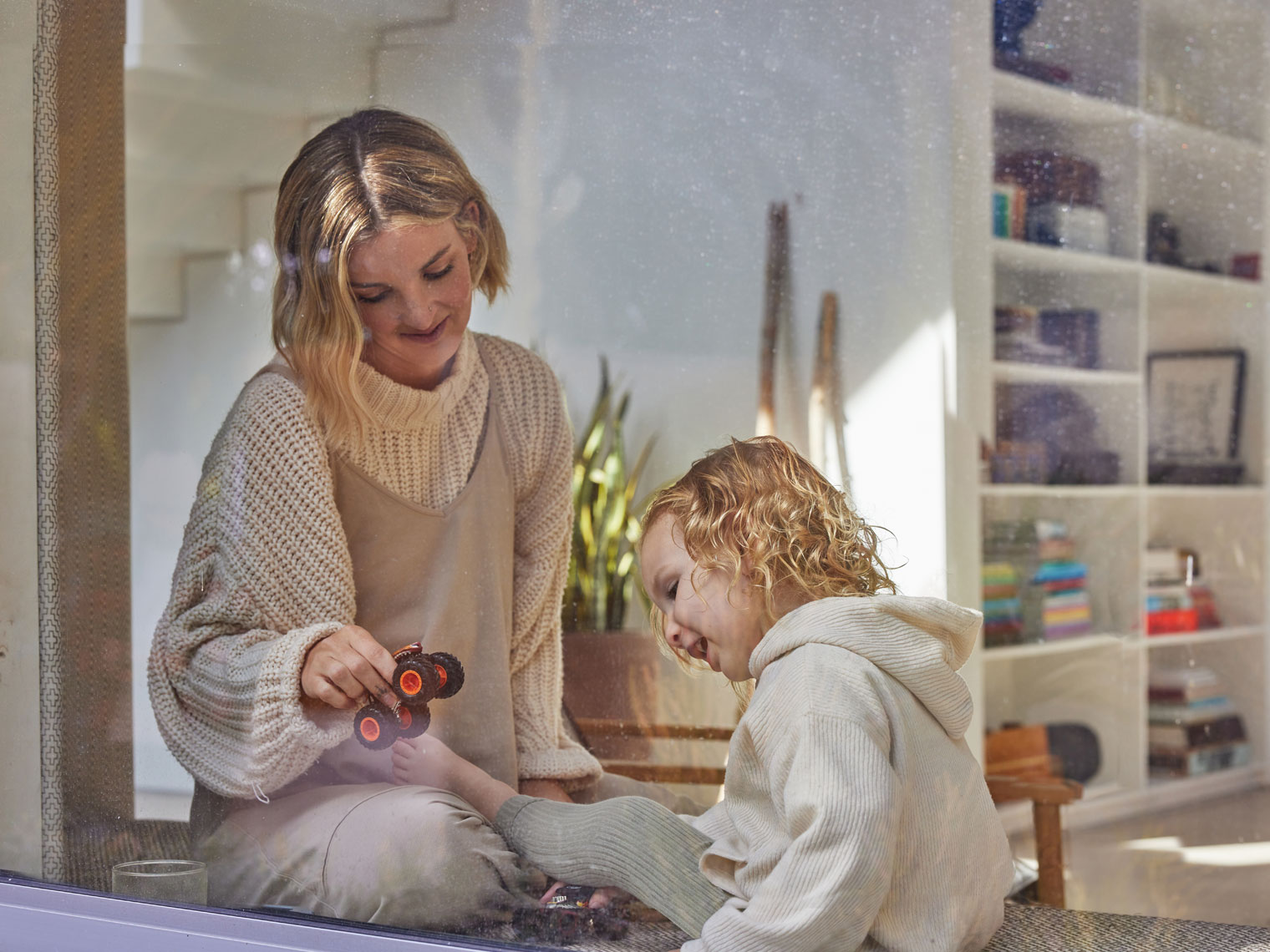 lifestyle-mom-and-boy-window